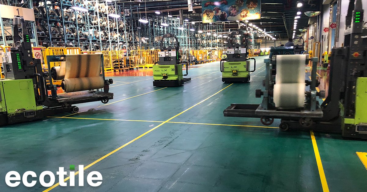 EcotileFlooring's tweet photo. What a difference good factory flooring makes! Here are our tiles in action in a factory with continual forklift traffic. No problems at all. We want to solve your flooring problems, such as keeping your factories safe. EcoTile is anti-slip and makes area-zoning simple. https://t.co/JIPAXqWPnH