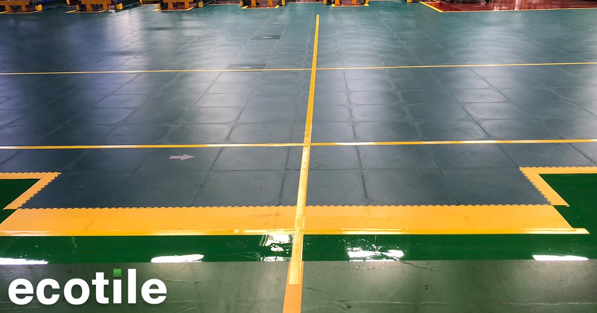 EcotileFlooring's tweet photo. What a difference good factory flooring makes! Here are our tiles in action in a factory with continual forklift traffic. No problems at all. We want to solve your flooring problems, such as keeping your factories safe. EcoTile is anti-slip and makes area-zoning simple. https://t.co/JIPAXqWPnH