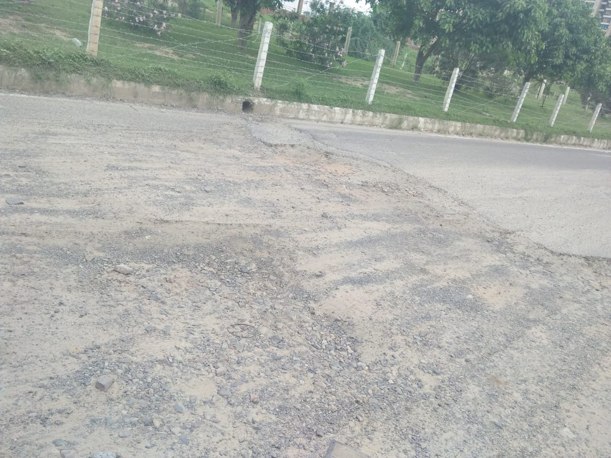 amitsingh_2704's tweet photo. Surajpur site c, opposite zeta1 Road is in very bad condition. Plz ask the authorities to repair. https://t.co/gb4ThRxhcs