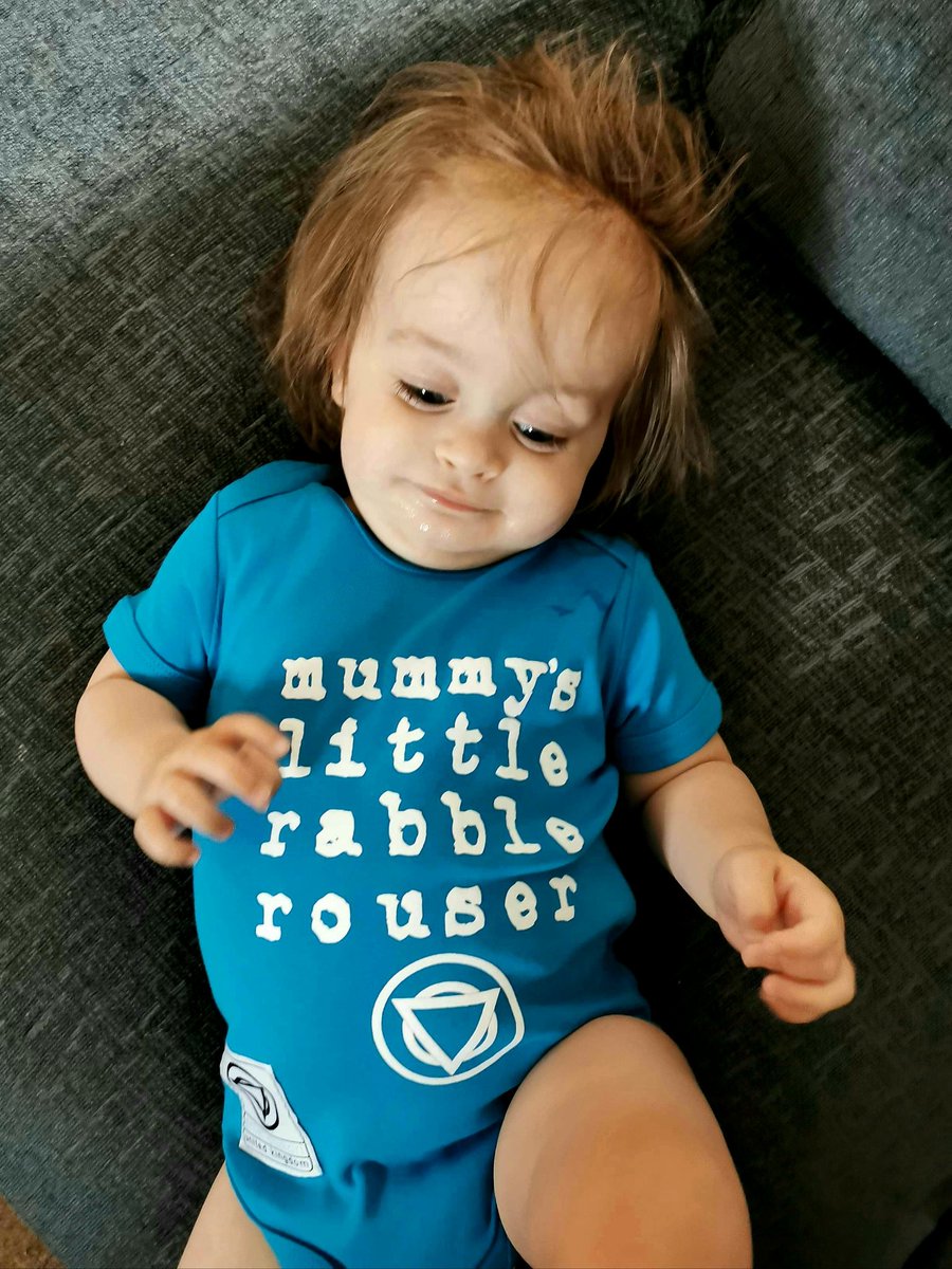 MrDanCoombs's tweet photo. @ENTERSHIKARI my little one finally fits her Rabble Rouser vest... Think she looks like a bit of a mini @RouReynolds with her hair. https://t.co/j8bQiWprOK