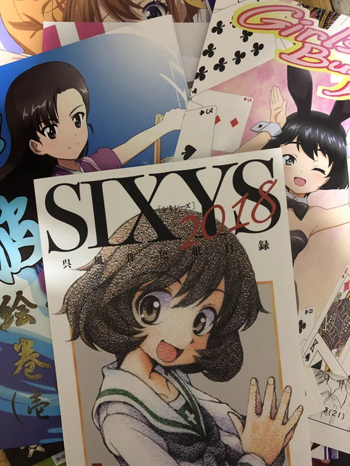 そして二日目自分がサークル参加してたんですがそんな中手に入れたガルパン本とゾンサガ本 