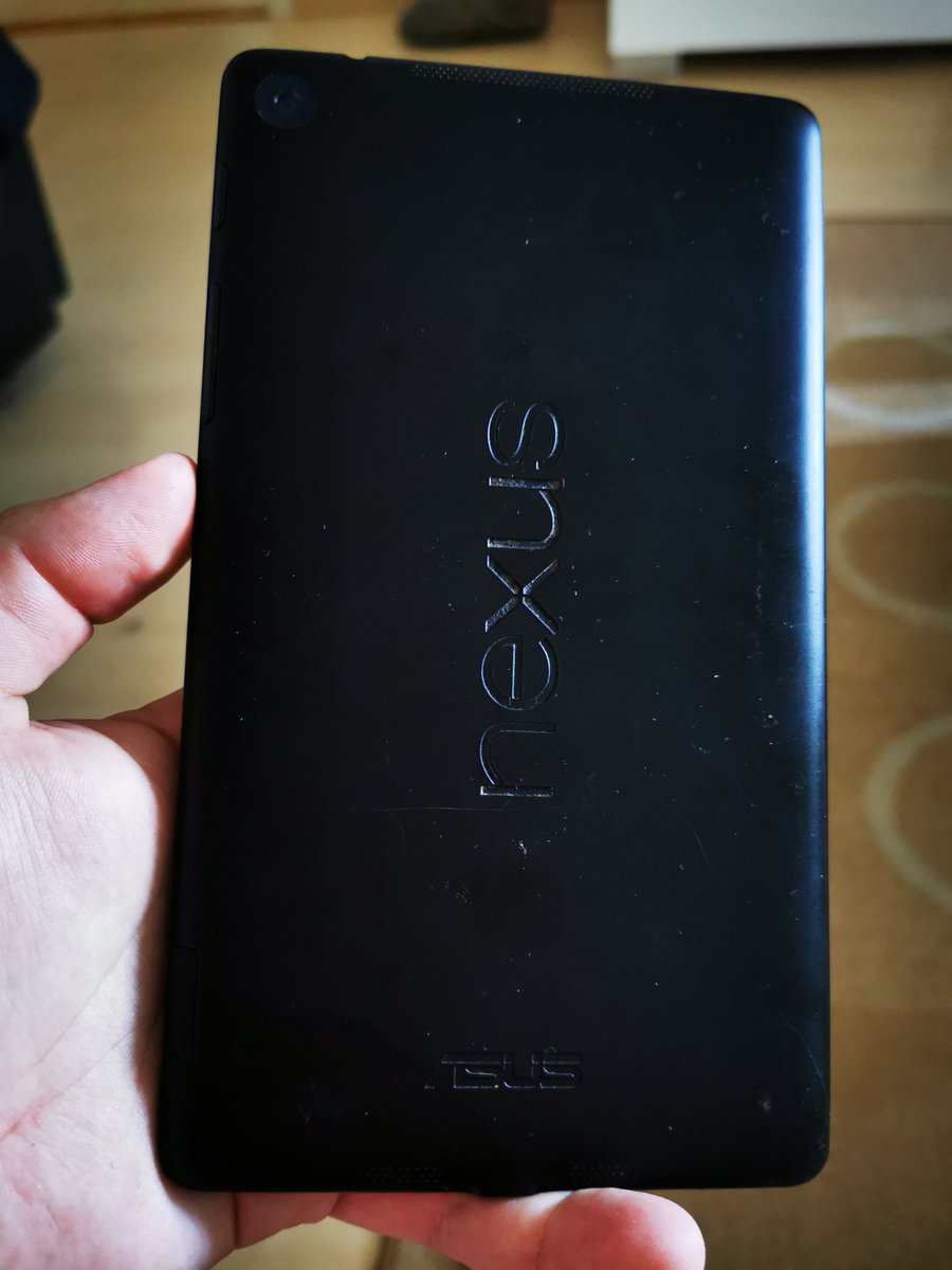 RODENT950's tweet photo. Trying to wake up this guy, It has a tough life behind it, back cell is cracked, charging port, headphone jack and sim tray are all broken, screen frame is cracked and piece of it has come off. But screen is like New one, no scratches no cracks.
#GoogleNexus7 #firstAndroid https://t.co/LtApCGTMyE