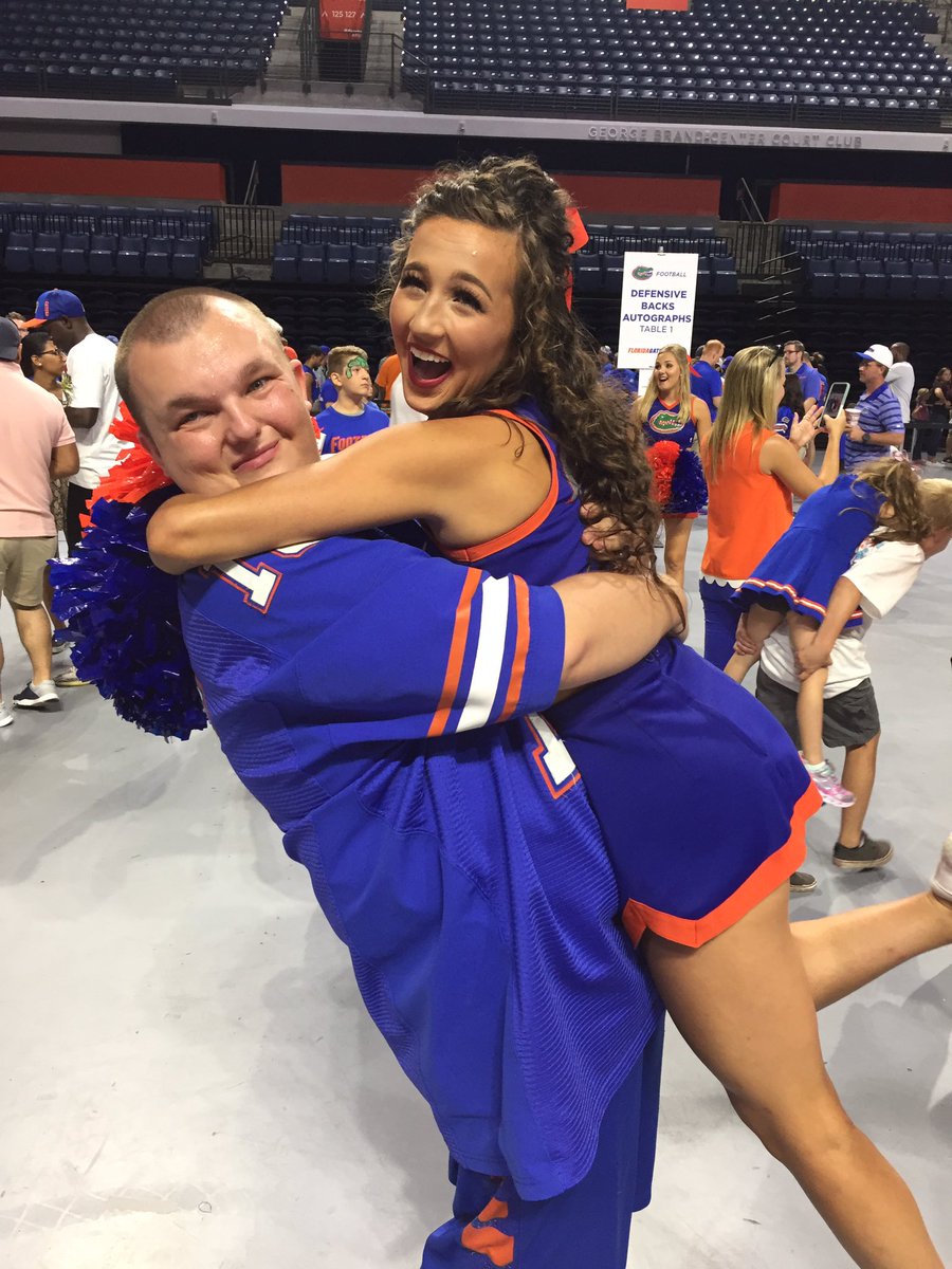 BillyM82094's tweet photo. @micahsheeerin and I had a blast at #GatorsFanDay on Sunday Micah was a ray of sunshine that day we hanged around on the arena floor and she signed the 2019-20 @UFCheer poster which I got 2 of them thanks Micah for an outstanding day GO GATORS! https://t.co/h3ceKlFZij