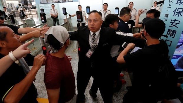 todaycanada's tweet photo. Hong Kong airport cancels all remaining flights for 2nd day 
https://t.co/UoDaMQ4okc https://t.co/GgH4eHBkQP