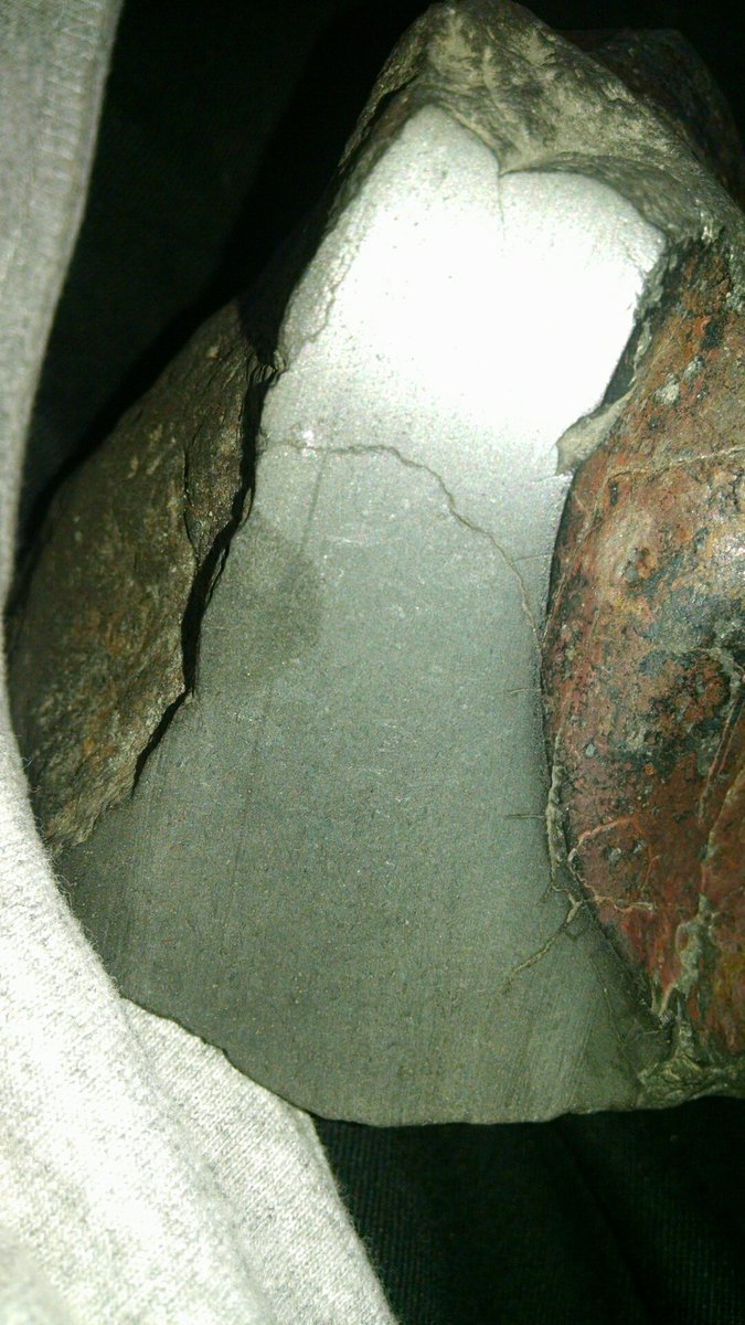 DuncanJesi's tweet photo. I need to know what I should do ? I believe I found a meteorite but I still am not sure if it is one? It magnet sticks to it , I cut a piece of the rock off and polished it smooth and its amazing ,If this rock is a meteorite I would like to sell it https://t.co/eZXZIjwJAJ