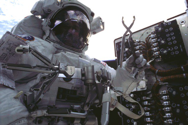 NASAHubble's tweet photo. Happy #LeftHandersDay! Hubble astronaut John Grunsfeld is left handed, which made him especially good at getting to 36 hard-to-reach connectors on the left side of Hubble’s power control unit when it was replaced in 2002. Hear more about it: https://t.co/ZW8HQUyKcd #HubbleClassic https://t.co/VLDErtmHtk