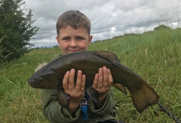 Young Thomas Chapple with a tench from a local river - first time targetting tench with dad. Well done Thomas!!
#fishingwithdad