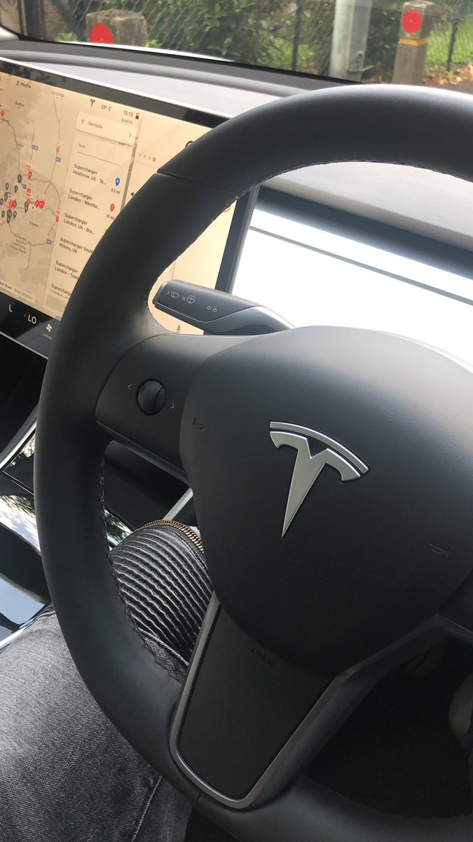 MrRoryReid's tweet photo. I’ve just hopped in a Tesla Model 3 and driven it about 200 yards. Had to pull over to tweet this. Hot take: it’s the best car in the world. https://t.co/r2DJtmQvcF