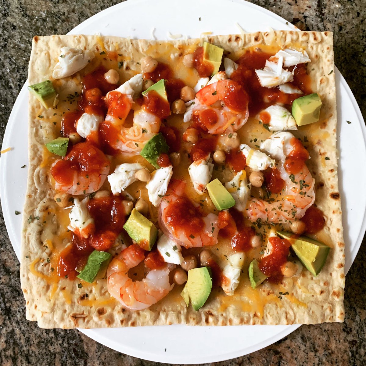 jmacrdldn's tweet photo. #lunch today was amazing! Made this #Lavashflatbread (from #TraderJoes). Shrimp, lump crabmeat, a little Mexican cheese, #garbanzobeans, a dollop of salsa! #delicious #nutritious high #protein and #fiber. Oh and avocado! #healthy #fitness https://t.co/00s5e0GJh3