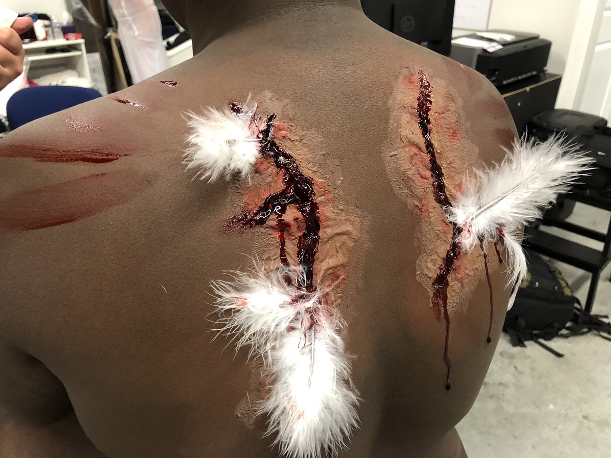 avelindel's tweet photo. I haven’t done sfx in a while &amp; not on darker skin before. Phone doesn’t pick it up as well as in person. 😂Had a little stage makeup to work with. Hoping it came out well for my first time 😅 #art #makeup #sfx #sfxmakeup #gore #goremakeup #lostwings #angel #latex #blood #wings https://t.co/qnBvfztiJr