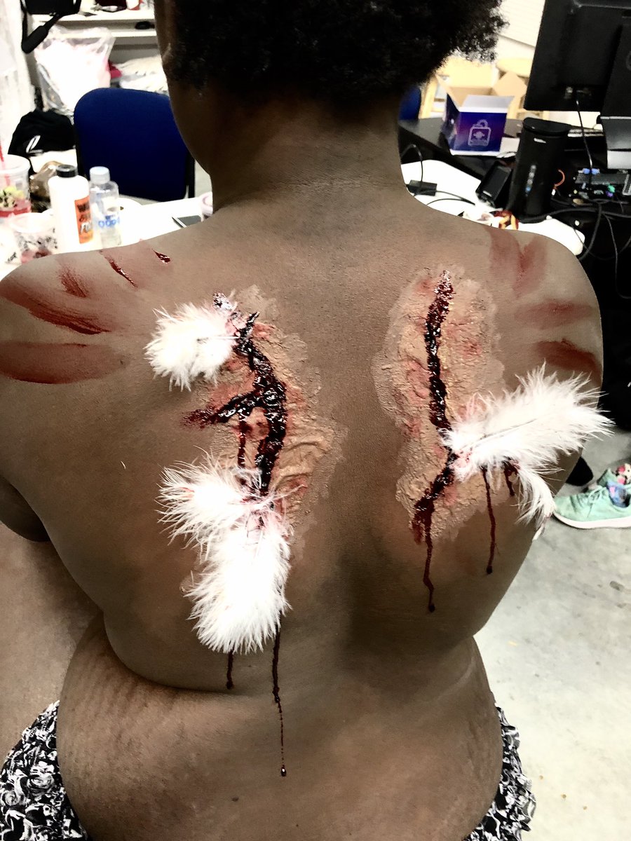 avelindel's tweet photo. I haven’t done sfx in a while &amp; not on darker skin before. Phone doesn’t pick it up as well as in person. 😂Had a little stage makeup to work with. Hoping it came out well for my first time 😅 #art #makeup #sfx #sfxmakeup #gore #goremakeup #lostwings #angel #latex #blood #wings https://t.co/qnBvfztiJr