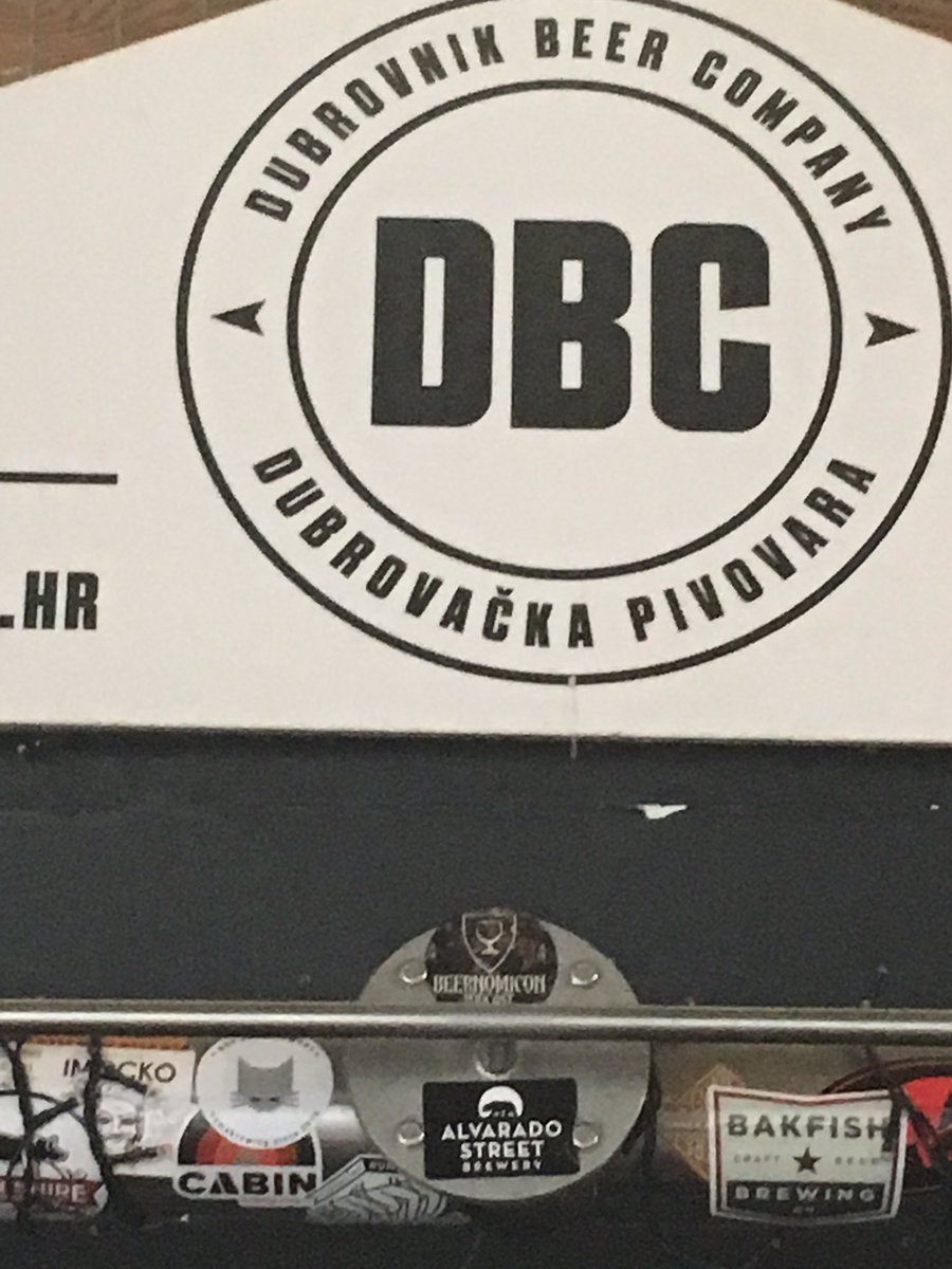 mmberney's tweet photo. Here’s @Muldydoona adding the @Beernomicon sticker to the @DubrovnikBeer bar top. Spreading the Manchester craft beer love in Croatia 🇭🇷 https://t.co/6FcawM1B1t