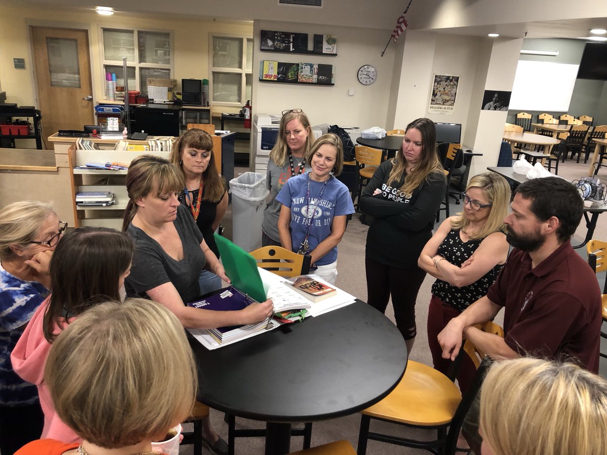 GCMSwolves's tweet photo. GCMS teachers have been hard at work getting ready for the year.  Here they are discussing #AVID binders schoolwide. #ecsrocks @eagleCOschools https://t.co/okZOV8UBXC