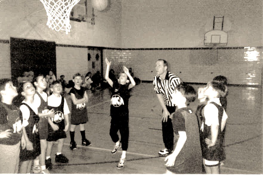 MinotFamilyYMCA's tweet photo. Basketball has always had it's place at our YMCA, especially since it was invented at a Y in 1891! Check out this awesome shot from years ago...you might even recognize the ref as our current Executive Director! 

#SOCIY175 #SWEEPSTAKES https://t.co/nWjkahqqNT