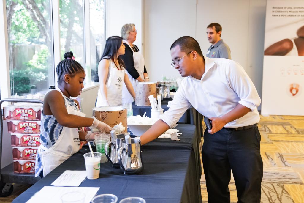 MarriottIntl's tweet photo. To celebrate #RootBeerFloatDay, associates at Marriott International headquarters raised funds for @CMNHospitals, including @ChildrensHealth in Washington, D.C., and enjoyed root beer floats served by @MissAmerica and @CMNHospitals Champions. #Serve360 #FloatsForKids https://t.co/ov719MiBep