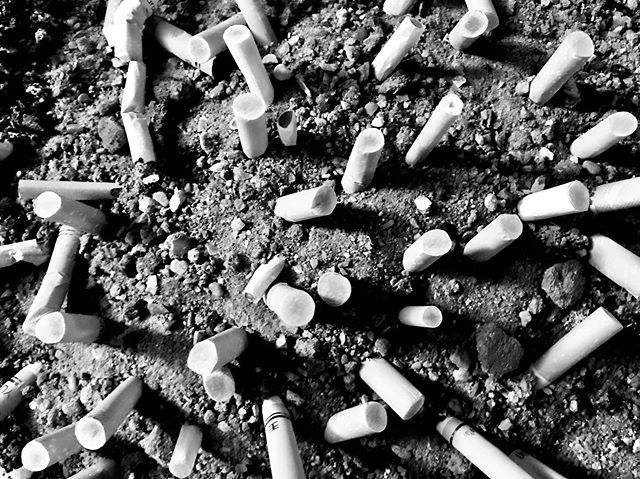 RichMonochrome's tweet photo. Cigarette Graveyard #ashtray #cigarettebutts #quitforlife #neverstarted #nonsmoker #monochrome https://t.co/ZU2dREkWn4
