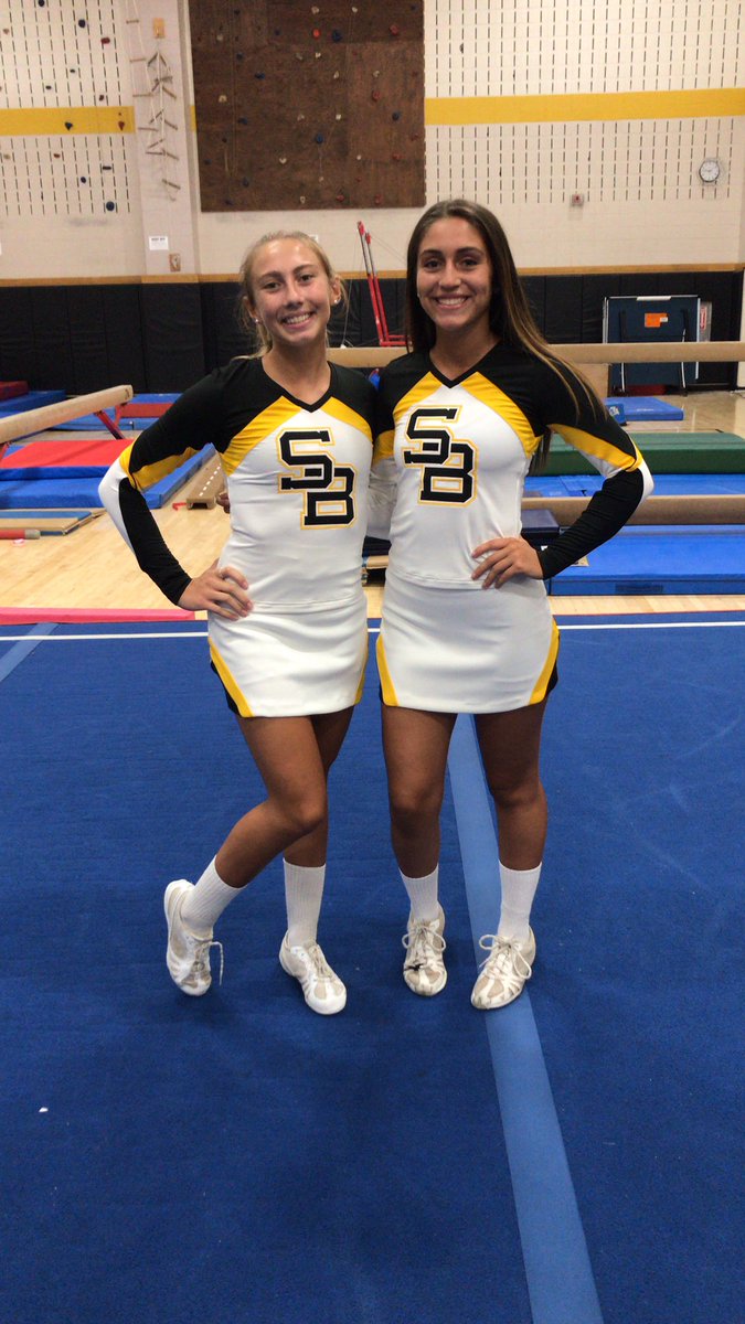 SBHSCheer's tweet photo. Uniform Reveal! Thank you so much @VarsityFashions @vsfSami for our brand new game day AND competition  uniforms. We LOVE them! 🖤💛 #SBVC #newunis #2020vision https://t.co/o2hLCuKGb8