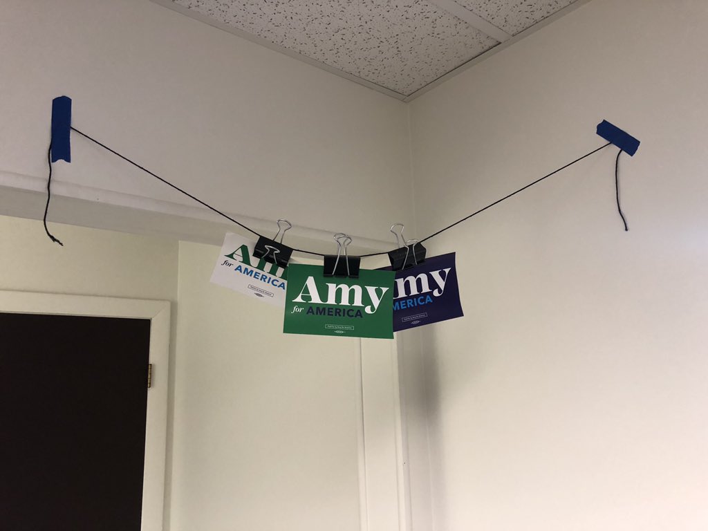 TeamAmyNH's tweet photo. Here's one of my world class life hacks! Looking for cheap and easy ways to decorate your home? All you need is:
✅ string
✅ tape
✅ binder clips
✅ Amy for America bumper stickers
Voila! You’ve got decorations!
-@BenBHarrold #FellowTakeover
#TeamAmy https://t.co/faQ00vUm3n