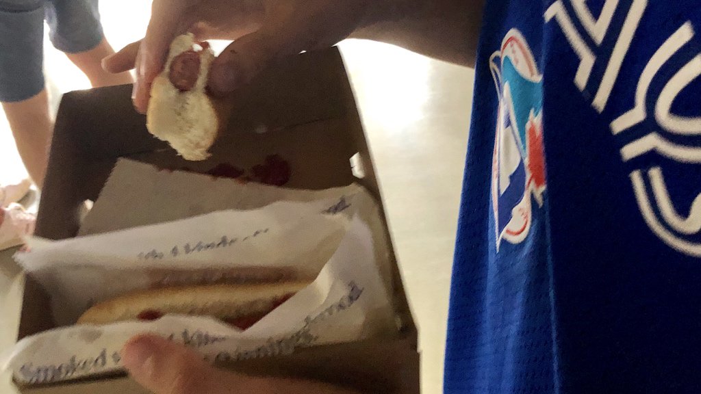 Oh my god we are not even to our seat yet and he’s finished one