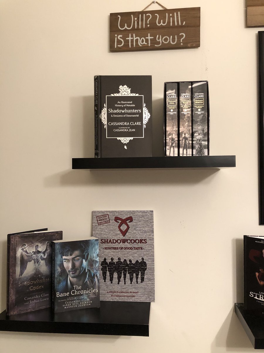 VVitch8's tweet photo. Y’all! I’m super excited to share my #Shadowhunters collection display I just put up in my office. It’s a mix of my love for the book series &amp; show!

Thank you so much to
@IconicNephilim 
@MalecFicLibrary 
@ShadowMerch 
@AlexandersStele 

#Saveshadowhunters 
#ShadowhuntersLegacy https://t.co/ybzrYrMSlQ