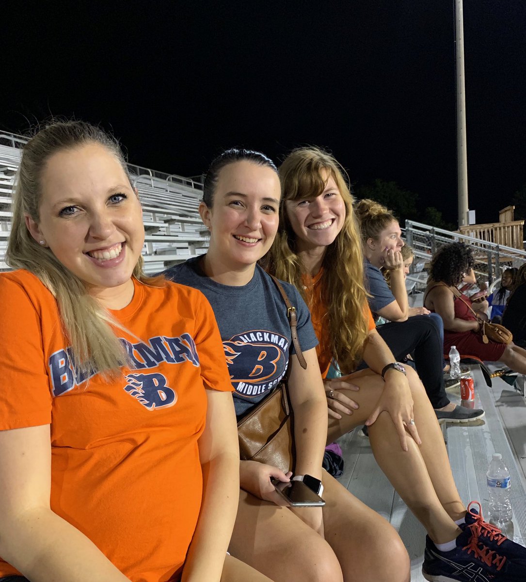 MrsMosesELAB's tweet photo. Baby Emery’s first BMS football game! Love these fabulous teacher friends! ⁦@MsBrainerdELA⁩ ⁦@Mrs_Lightfoot_7⁩ 🔥 Go Flames! 🔥28-0 with 1:54 left in the half. #HeatinUp #WeAreBlackman https://t.co/zs45P8fEoU