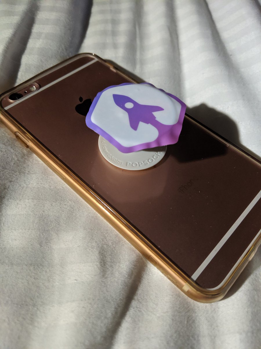 tooshel's tweet image. My daughter upgraded her popup phone holder thanks to #noderockets @JSConfUS. It&apos;s a BIG DEAL because she covered up a unicorn and rainbow she just had to have. I need to cut one of these stickers round to perfect it Can&apos;t wait to see her laptop one day.