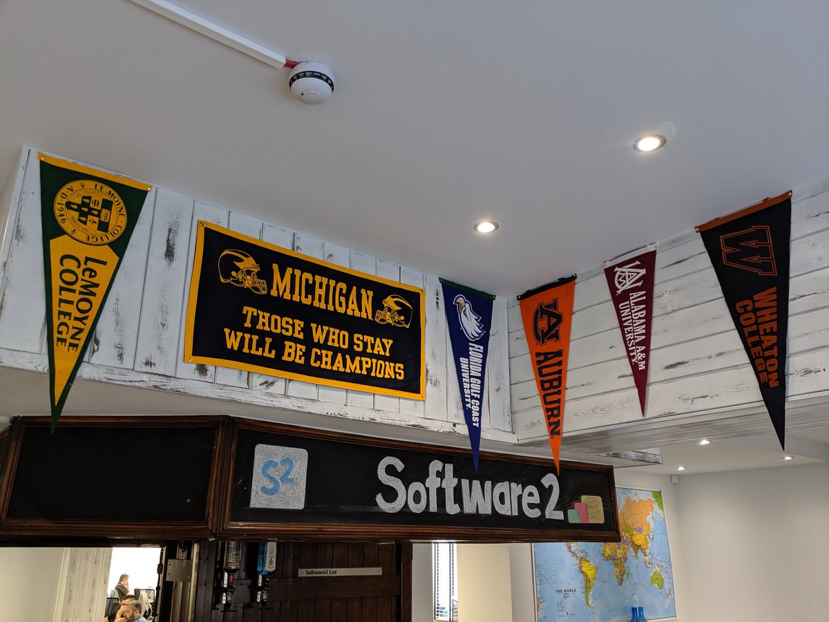 AppsAnywhere's tweet photo. Our new HQ is starting to feel really homely with some more representation from our customers, elegantly modelled by @PeterAtS2 and Phil Morgan! @aamuedu @AuburnU @WheatonCollege @Wheaton_Thunder 
#us #uscollegesports #flags #customers #proud #highereducation #softwaredelivery https://t.co/QMYfYohtG9