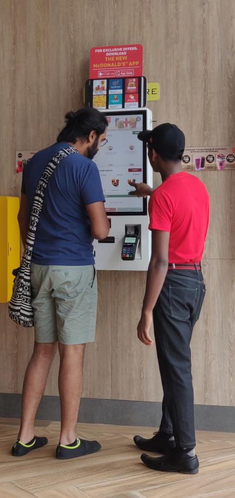 s_jayaswal's tweet photo. How does @McDonalds ensure a simple easy to use interfaces? They hire a guy to use it for you! #jugaad #baddesign https://t.co/6DqvU1BWrC