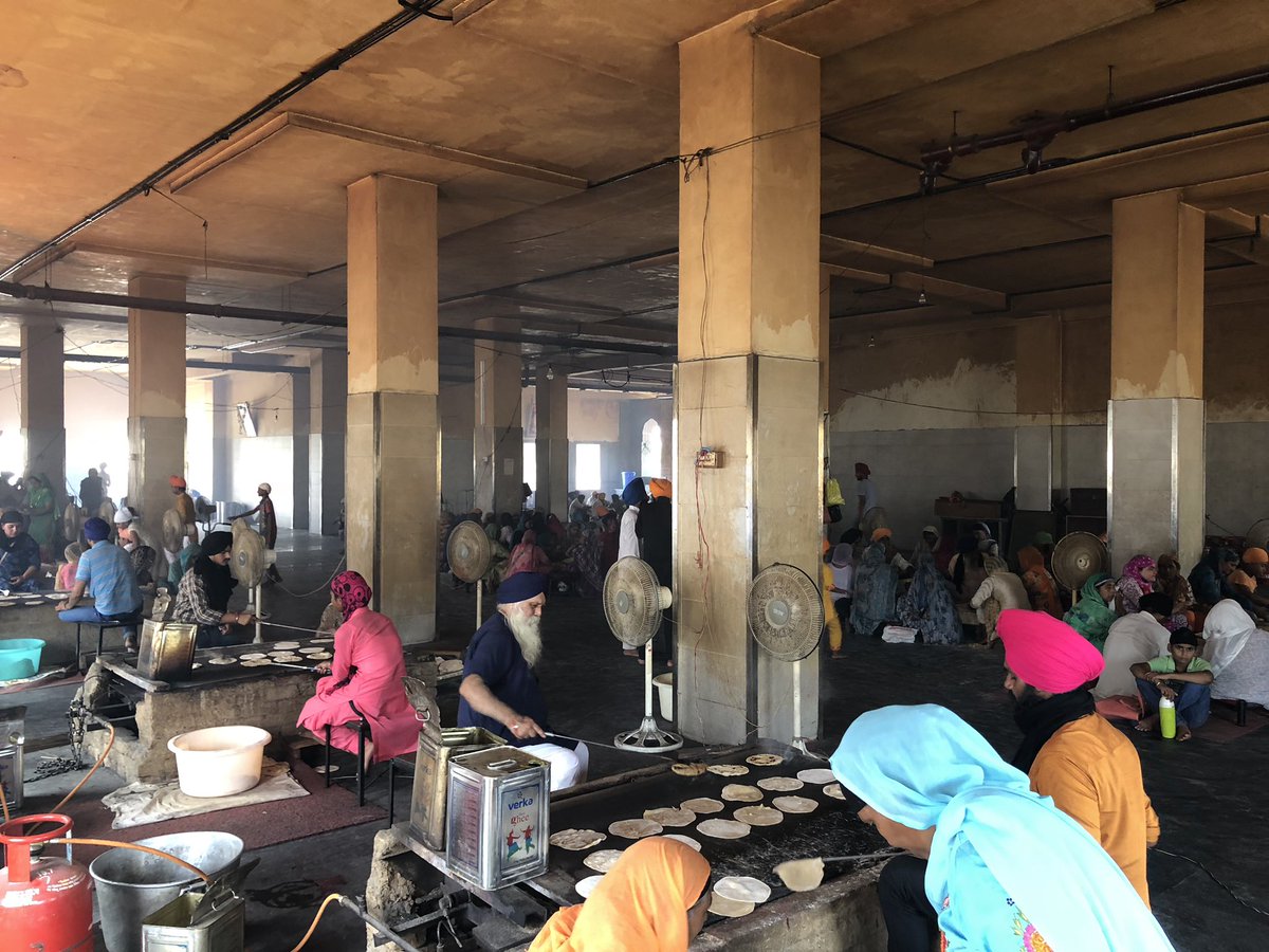 The mega-kitchen with mega-bartans at the Golden Temple, Amritsar. Running 24/7 & feeding up to 100,000 people a day. Image 2 is of water put to boil for chai. A hall full of roti makers make 200,000 rotis a day on an average. Amazingly, this is 90% volunteer (Sevadaar) run.