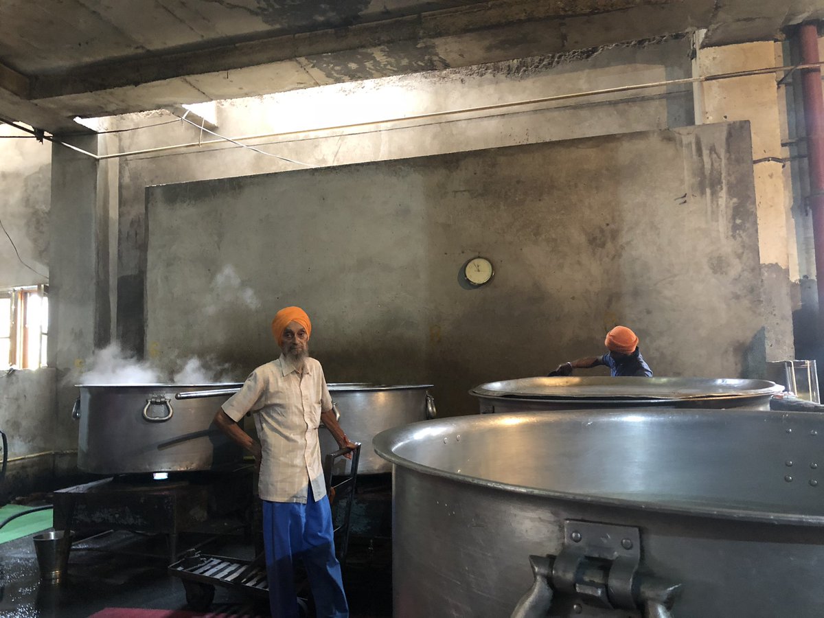 The mega-kitchen with mega-bartans at the Golden Temple, Amritsar. Running 24/7 & feeding up to 100,000 people a day. Image 2 is of water put to boil for chai. A hall full of roti makers make 200,000 rotis a day on an average. Amazingly, this is 90% volunteer (Sevadaar) run.