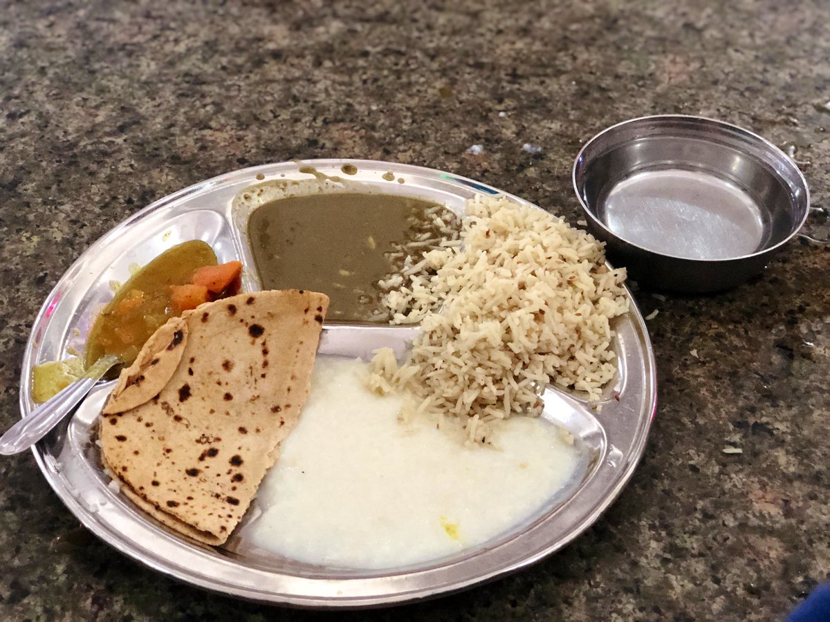 The mega-kitchen with mega-bartans at the Golden Temple, Amritsar. Running 24/7 & feeding up to 100,000 people a day. Image 2 is of water put to boil for chai. A hall full of roti makers make 200,000 rotis a day on an average. Amazingly, this is 90% volunteer (Sevadaar) run.