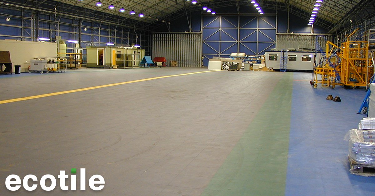 EcotileFlooring's tweet photo. So tough you can drive an airplane on it! EcoTile flooring offers a 10mm interlocking floor tile expertly designed to withstand heavy loads and high traffic movements. While it works perfectly in aircraft hangars, it can also be used with HGV vehicles or heavier fork lift trucks. https://t.co/ZtN7BzKa7m