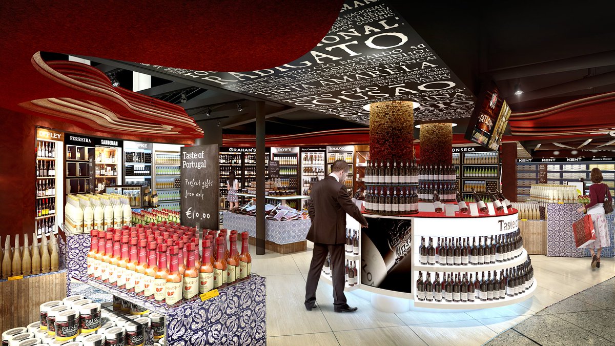 The central feature of the new Porto airport duty free store, “Taste of Portugal”, presents a shopping zone dedicated to a wide range of regional foods. Oustanding detail emphasises Sense of Place including the cork tree and iconic blue and white Azulejo Portuguese tile. #airport