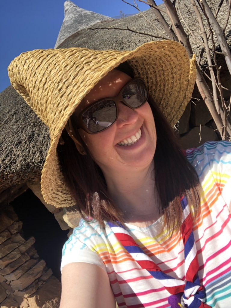 pam_g21's tweet photo. @TBCVillage with @lesotho2019 team! Great morning sitting on the chief’s seat and wearing his hat in the court circle! @ScotlandINTOPS @GirlguidingScot @Guides3rd @Girlguiding #UKinLesotho https://t.co/B3sZhMs6EK