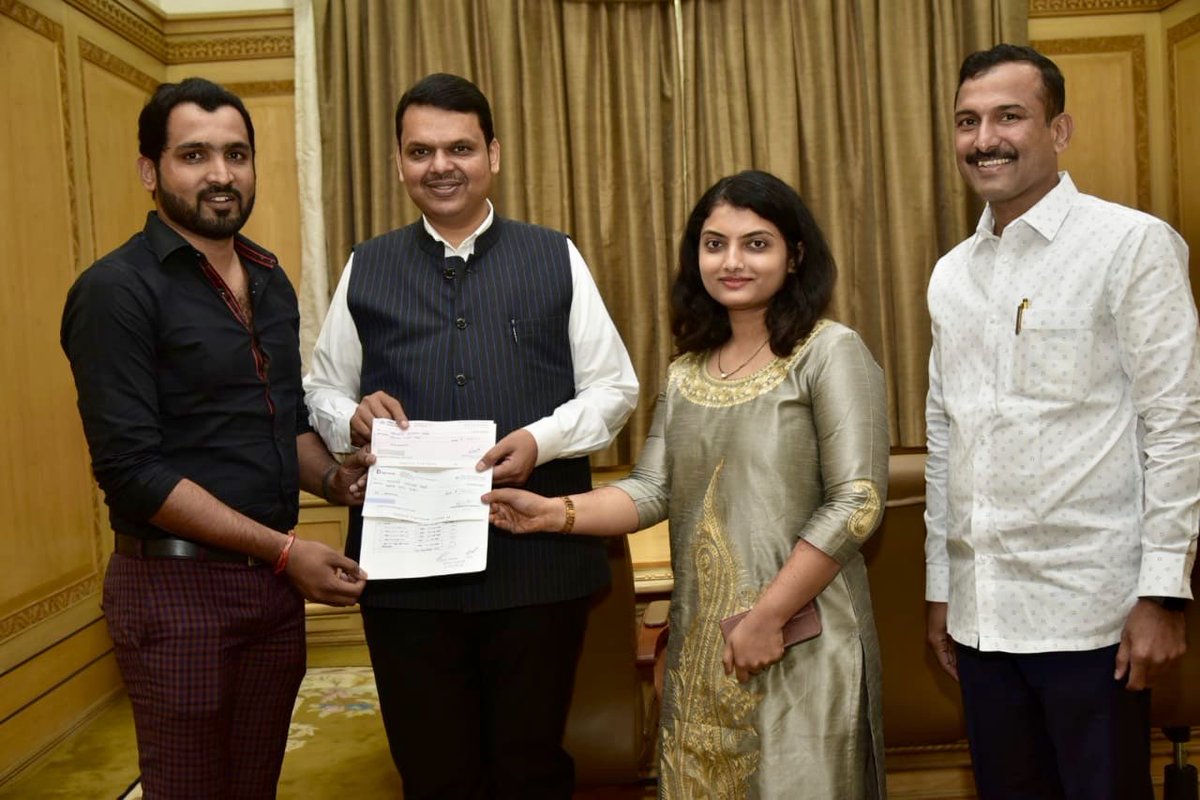primedankar's tweet photo. Handover  all of our 1,11000/- of #सरपंच_मानधन to CM Relief fund by the hands of @Dev_Fadnavis ji and in presence of @BalaBhegade ji for #kolhapurflood victims
We both are sapanch of our respective villages @CMOMaharashtra @PMOIndia @narendramodi https://t.co/QHJV1pXMJX