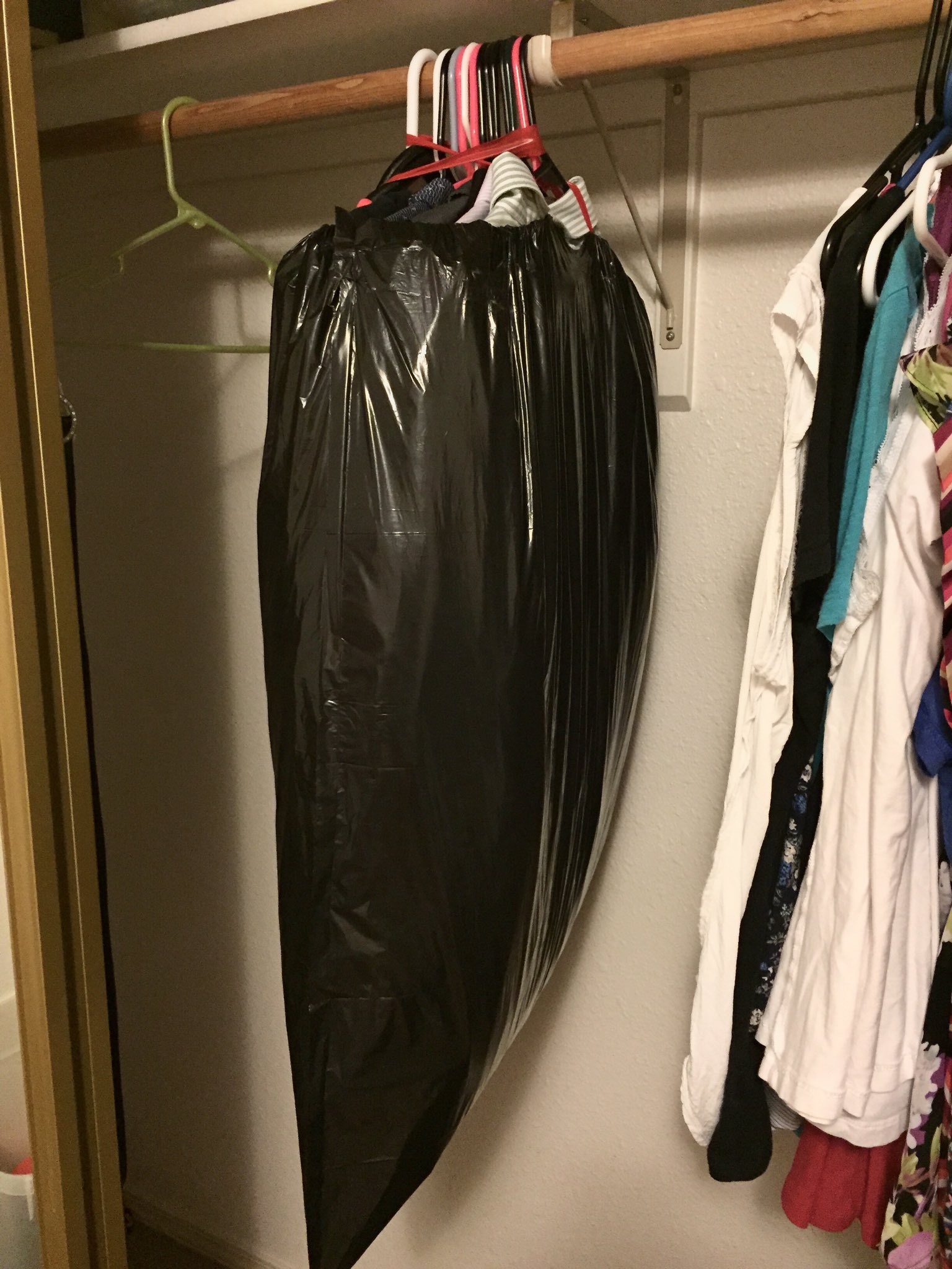 Ania Krutul on X moving tip put a trash bag around your clothes and tie the hangers with a rubber band. that way you don t have to worry about hanging up all