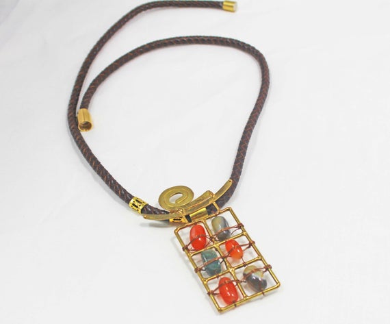 hvaradhan's tweet photo. Statement Brass Pendant, Orange https://t.co/fOLTCEXiLT via @EtsySocial #beaded necklace #metal beaded ncklace #rectangularpendant #bras https://t.co/3EHhNWIomA