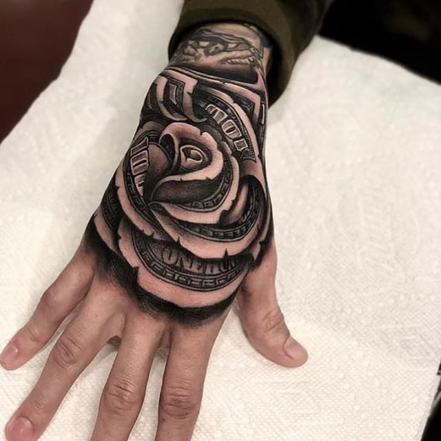 John Révolté on X: "Dollars and roses by @chicanoace Tattoos on the hand: 100% or no-go-zone? #blackworkers #blackwork #blackworktattoo #blackworktattoos #blackworktattooing #blackworkerssubmission #blacktattoomag #blacktattooart ...