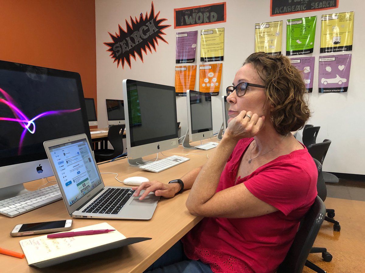 A2schools's tweet photo. .@a2Thurston librarian Sharyl Burau (in red) learns the finer points of @Twitter at an #AAPSTechFest class led by @lesliefisher. Lots of learning going on today at @SkylineHighA2. @A2SchoolsSuper https://t.co/bmAKYPXP7u