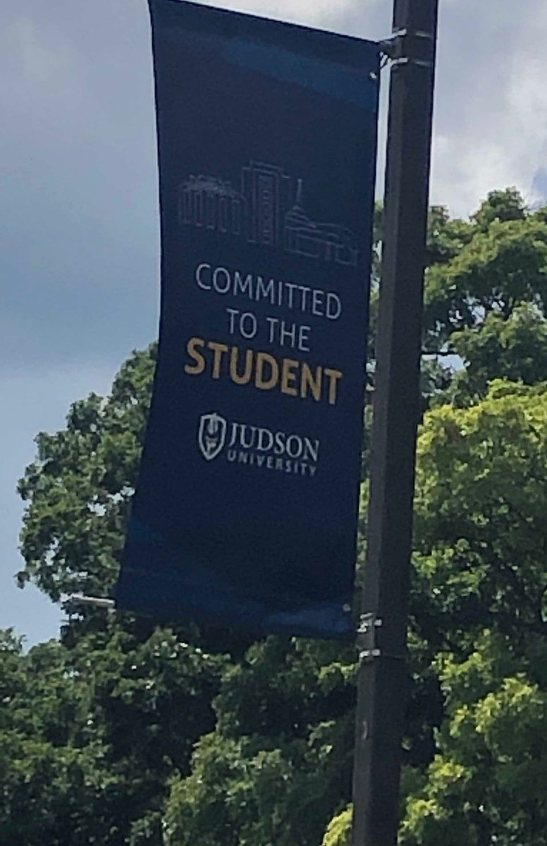 JudsonU's tweet photo. Judson’s new banners share the university’s priorities of being committed to students, spiritual formation, leadership and excellence. Thanks @BigSigns_com and Judson’s Plant Ops team for making this happen. https://t.co/vyFA9Pzsdj