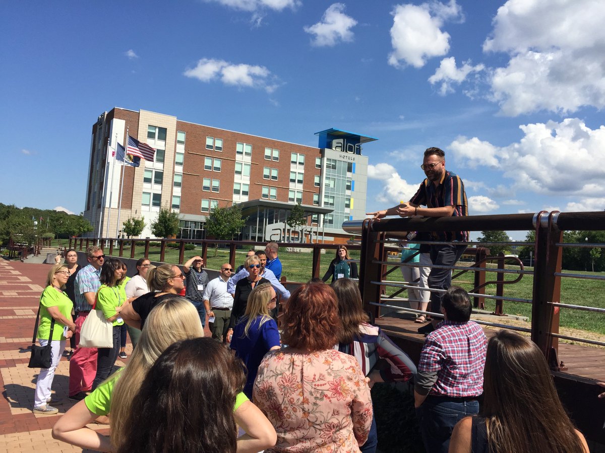 LeadSyr's tweet photo. There is nothing better than traversing #Syracuse with Michael Heagerty on a beautiful day! Thanks to @saltcity_tours for taking our #LGS Class of 2019 on a wonderful Creek Walk tour. #EconomicDevelopment #LeadSYR #CentralNewYork https://t.co/POXuyVtAR3