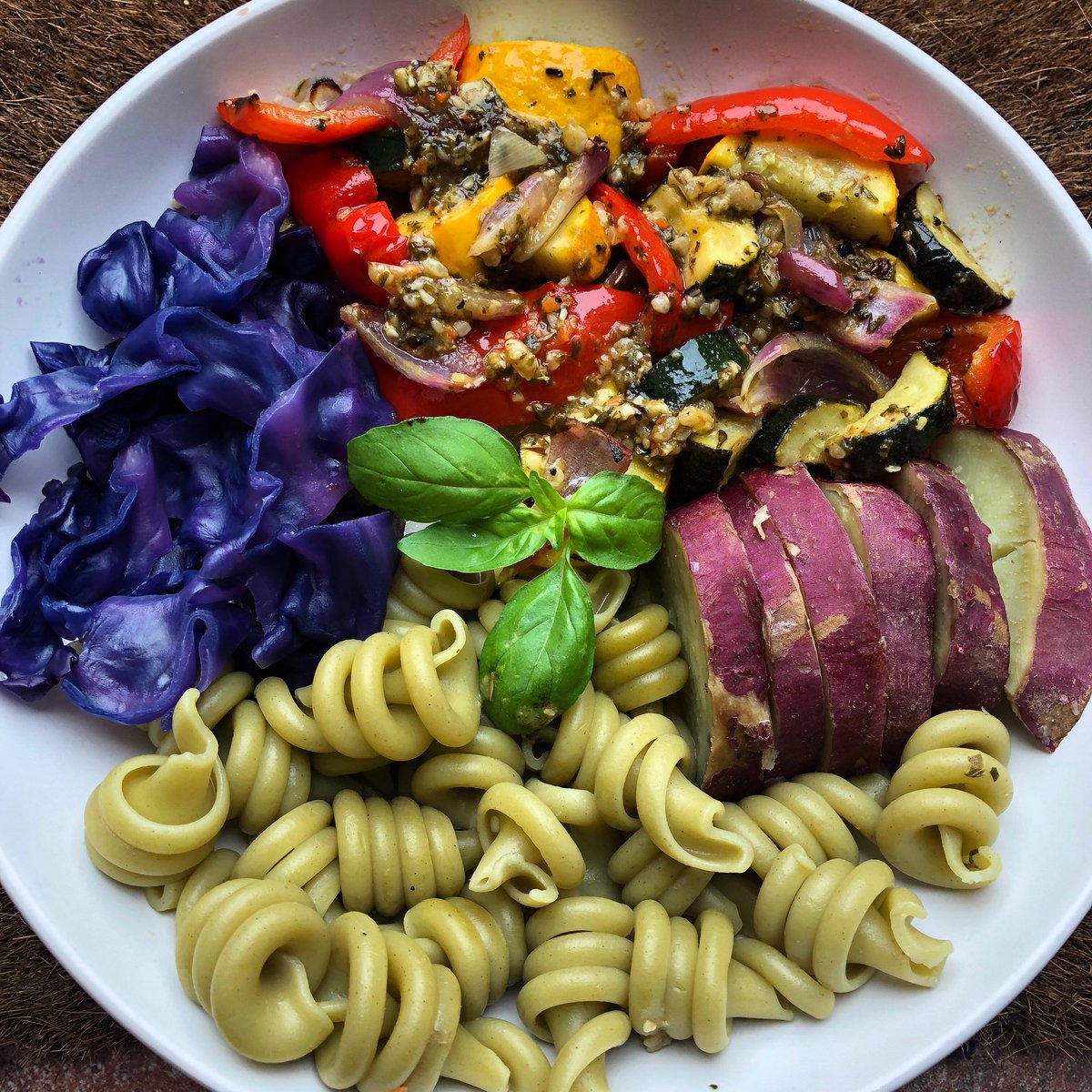 Absolutely love making colourful food ! #Spinachpasta #purplecabbage 
#purplesweetpotato  and #yellowcourgette #greencourgette #redonion and #redpepper in homemade #pesto and #lemon sauce. 🌱🌱🌱🌱🌱🌱🌱#vegan #eattherainbow🌈 #veg #fresh  #health #weight #nutrition #yummy