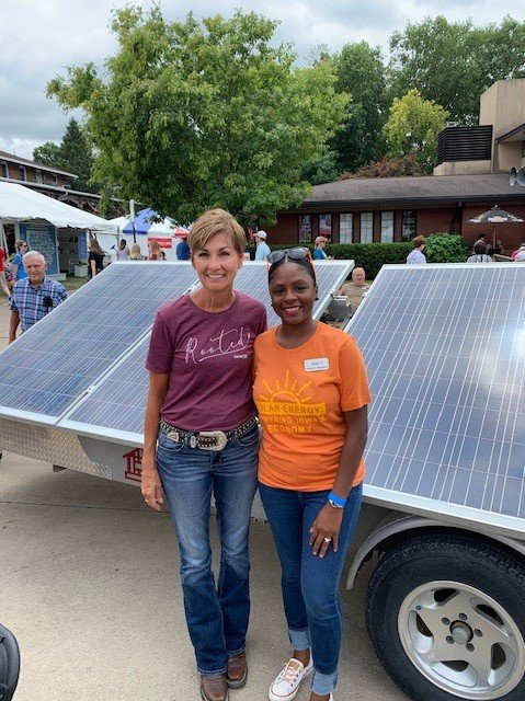 SEIA's tweet photo. At the #IowaStateFair2019, #solar was on full display! Thank you, Governor @KimReynoldsIA for your support of #solar energy and for making today Iowa #solarday. 

SEIA’s @Nakhia_M was there to represent the industry and celebrate the rise of Iowa renewables. #TheSolarDecade https://t.co/QvTOBjzQYU
