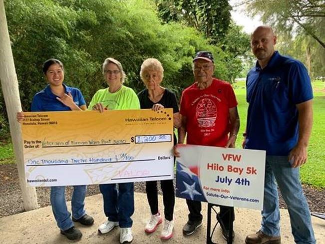 HawaiianTel's tweet photo. Our veteran support employee group VALOR presented a check for $1,200 to the Veterans of Foreign Wars – Pāhoa, Hawaii Chapter. This generous donation was made possible by generous Hawaiian Telcom employees that participated in our 4th of July Flag Fundraiser. #CommittedToHawaii https://t.co/3SjDtmeYZZ