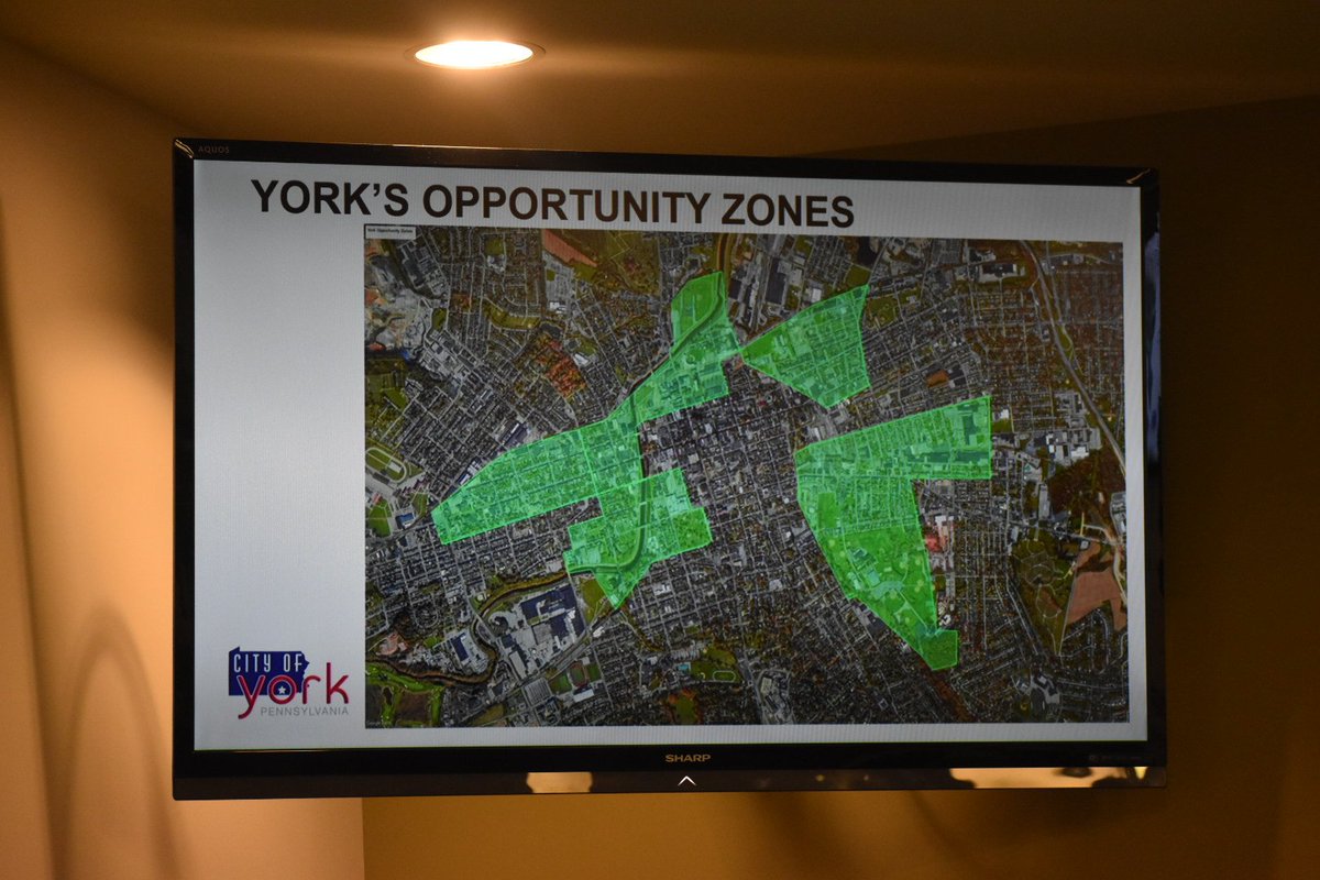 .#OpportunityZones are being discussed Wednesday night at York City Hall as part of <a href="/CityofYorkPA/">City of York</a> town hall meetings. On hand is chief opportunity development officer <a href="/BlandaNace/">Blanda Nace</a>, York Mayor <a href="/GivemHelfrich/">Michael Helfrich</a>, grant contractor Samantha Dorm &amp; chief of staff Philip Given.