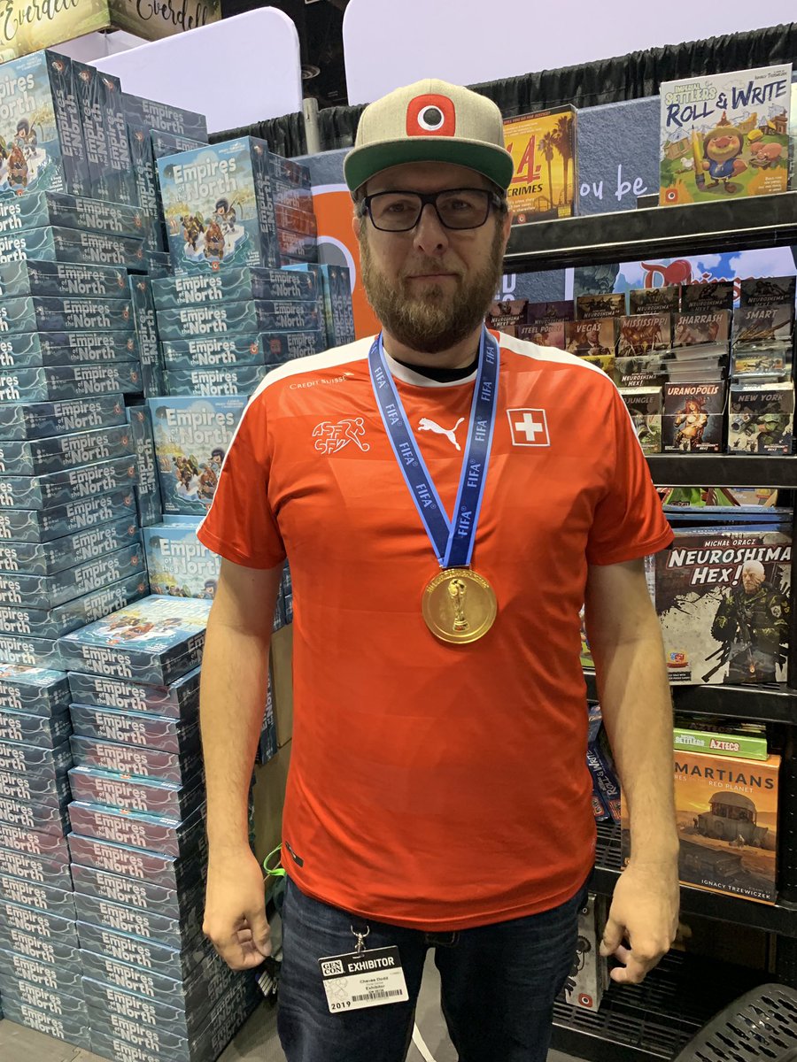 ScaughtyMcC's tweet photo. Found the Champ representing at the Portal Games booth @trzewik #WorldCup #GenCon2019 Better luck next year Ignacy https://t.co/tESVCFEh6d