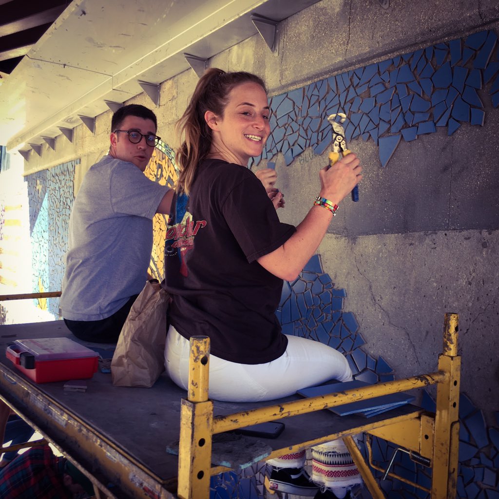 RelativityHQ's tweet photo. This afternoon members of our marketing team joined the good folks at @greenstarmvmt to help create bricolage mosaics - using tiles and mirrors - in Chicago’s Logan Square neighborhood. It was a fun time, but I’m still scraping mortar off my hands! #RelativityGives https://t.co/0tYzPsnPqU
