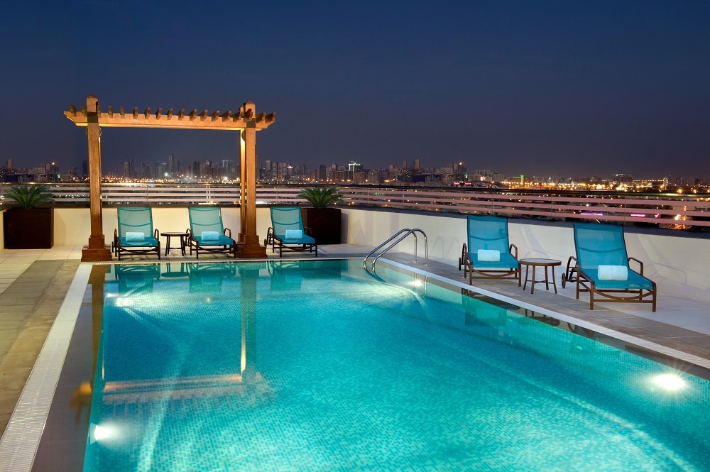 HiltonDeira's tweet photo. Soak up the views of Dubai whilst taking a dip at Hilton Garden Inn Dubai Al Muraqabat.
#HiltonGardenInn #Dubai #Hilton #Relax #Summervacation #Poolview https://t.co/aqC3ny0Ca3