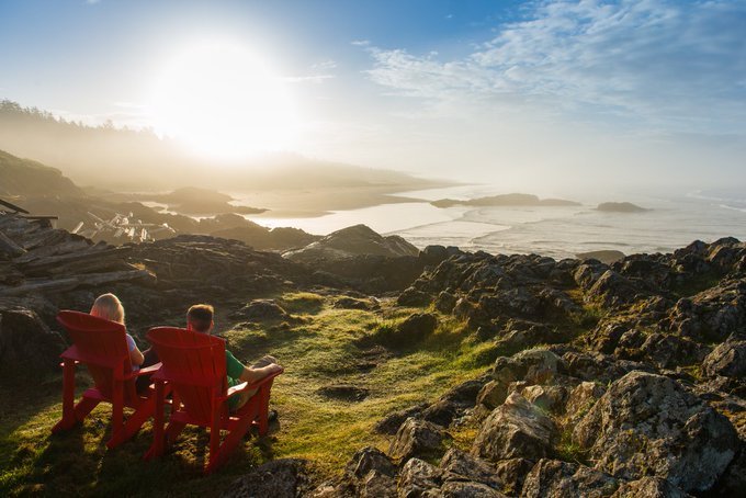 Canada's tweet photo. Have you seen these #redchairs in Canada’s National Parks? They offer visitors a chance to take a break and connect with @ParksCanada’s beautiful surroundings. Share your own pics from the chair with the hashtag #sharethechair! https://t.co/4exjgAqO4A