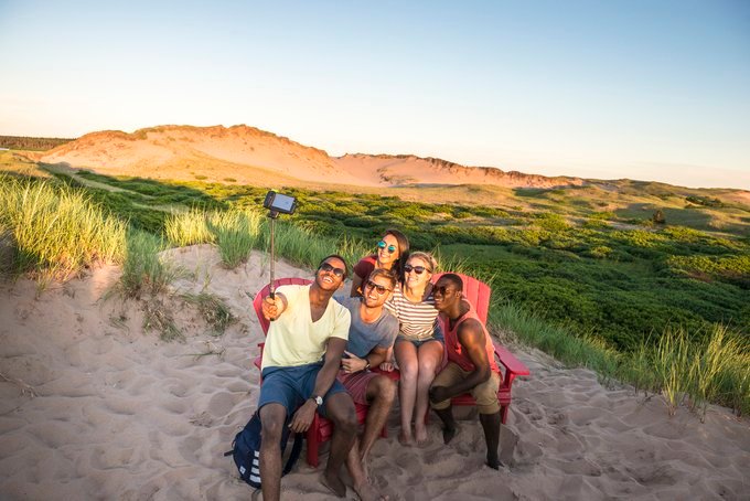 Canada's tweet photo. Have you seen these #redchairs in Canada’s National Parks? They offer visitors a chance to take a break and connect with @ParksCanada’s beautiful surroundings. Share your own pics from the chair with the hashtag #sharethechair! https://t.co/4exjgAqO4A